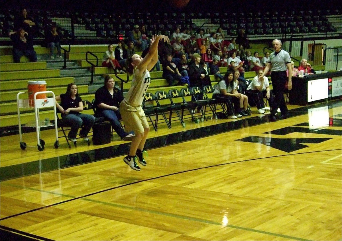 Image: Tara hits a triple — Tara Wallis(5) spots up for a game-tying 3-pointer in the fourth quarter. Wallis finished with 12-points.