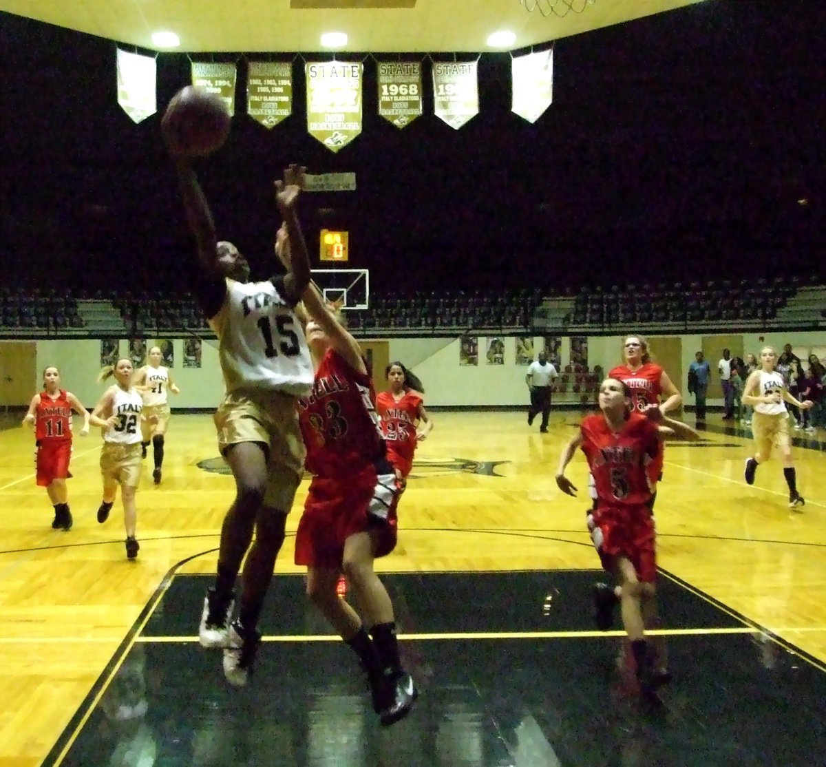 Image: Kortnei can — Kortnei Johnson(15) sprints the floor for a fast break layup.