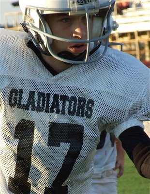 Image: Ryan Connor — Quarterback Ryan Connor gets set to lead the Italy Junior High Gladiators into battle against the Leon Cougars.