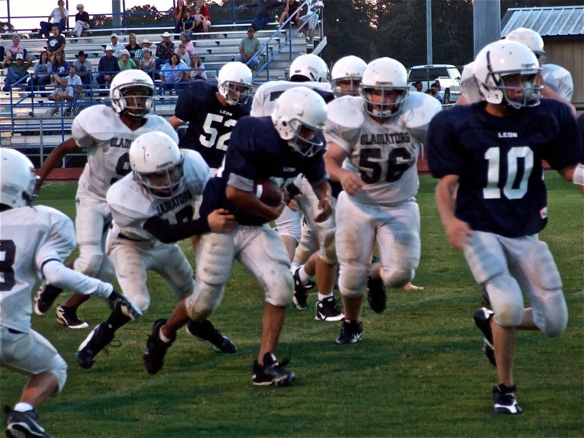 Image: I got him! — Ryan Connor(17) latches on to a Leon Runner.