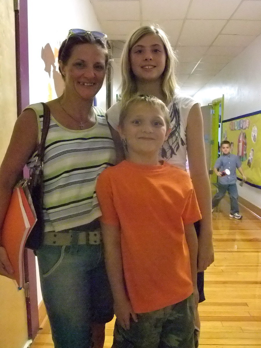 Image: We Are Ready — This family is ready for school.