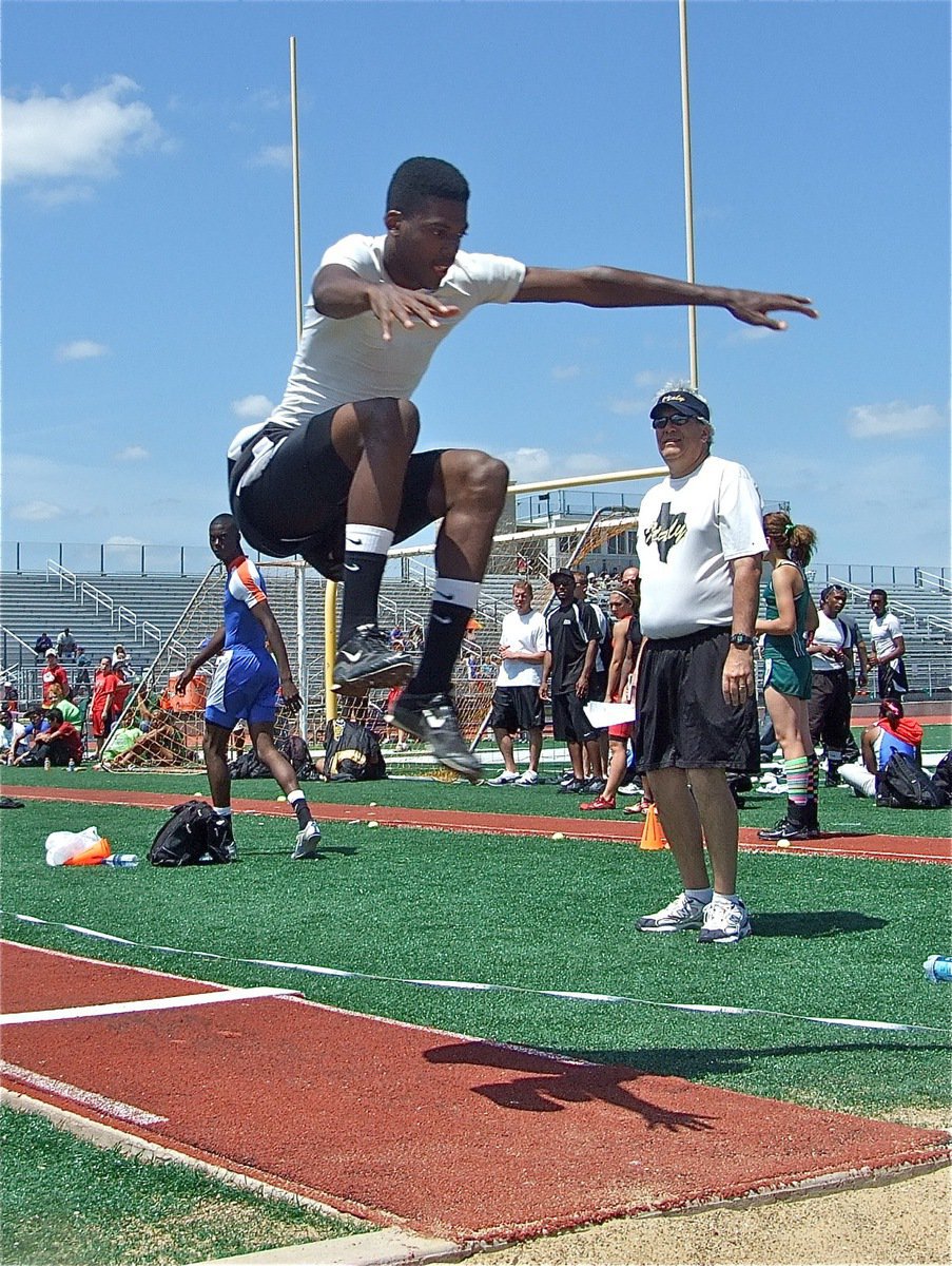 Image: John astounds — Italy’s John Isaac takes 4th place in the long jump and 1st place in the triple jump.