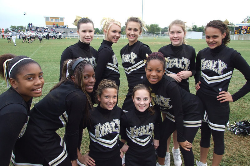 Image: IHS Junior High Cheerleaders — The Junior High Cheerleaders take time for a smile.
