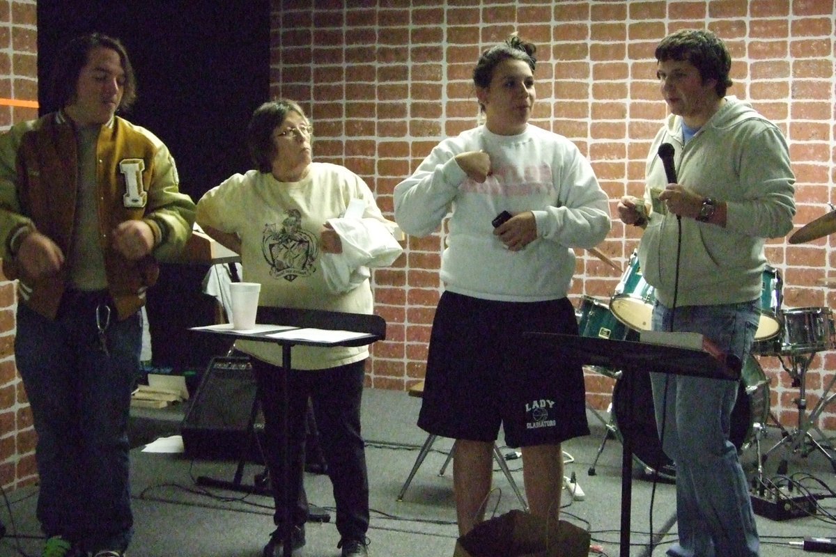 Image: Fun Had By All — Zach Hernandez and Molly Haight join Karen Mathiowetz and Chris Talleri on stage with prizes.