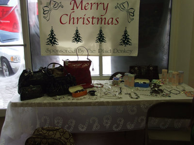 Image: Plaid Donkey’s Booth — Plaid Donkey displayed many purses and lots of jewelry.