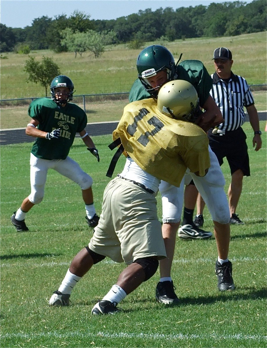 Image: New kid on the block — Jalarnce Jamal Lewis(17) joined the Gladiators this past week and makes a block during the scrimmage against Valley Mills.