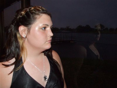 Image: Meredith reflects — Meredith Brummett reflects on her senior year during the prom.