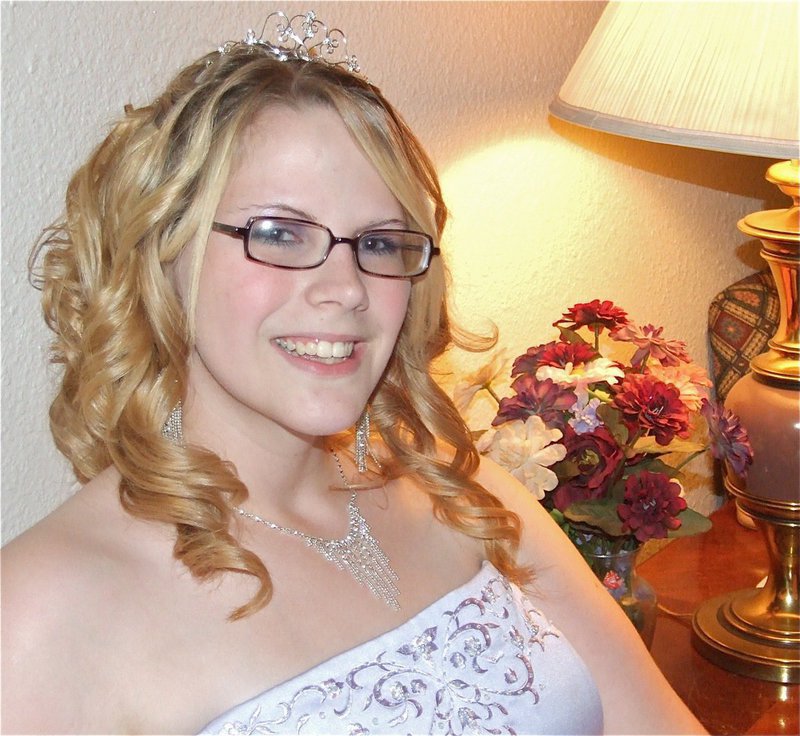 Image: Taking a break — Ashley Sierakowski takes a break from the prom dancing.