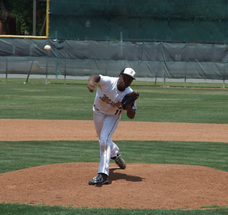 Image: Anderson begins the game — Jasenio Anderson pitched in the double header against Hawley.