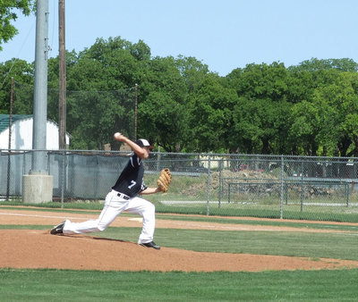 Image: Trevor pitches heat — Trevor Patterson stops a few Bearcats at the plate.