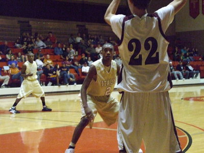 Image: Clemons Covers — Italy’s #2 Heath Clemons intently covers his man on defense.