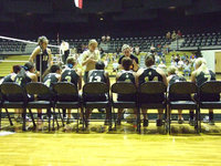 Image: Coaches Richters and Reeves — The Lady Gladiators hear the battle plan.