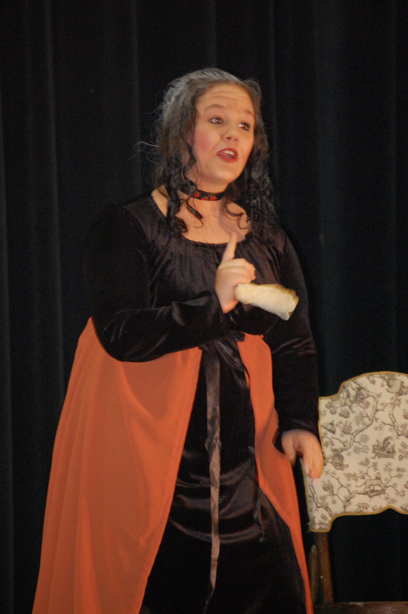 Image: Leticia speaks — Raborn Sprabary as Leticia Carruthers tells the audience how sad she is.