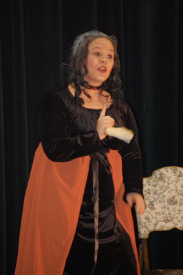 Image: Leticia speaks — Raborn Sprabary as Leticia Carruthers tells the audience how sad she is.