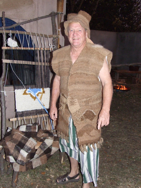 Image: The Weaver — The Weaver has a hut with wonderful yarns and fabric creating blankets.