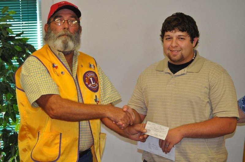 Image: Mark Souder &amp; Ivan Roldan — Mark Souder is proudly presenting Ivan with the Lions Scholarship check.