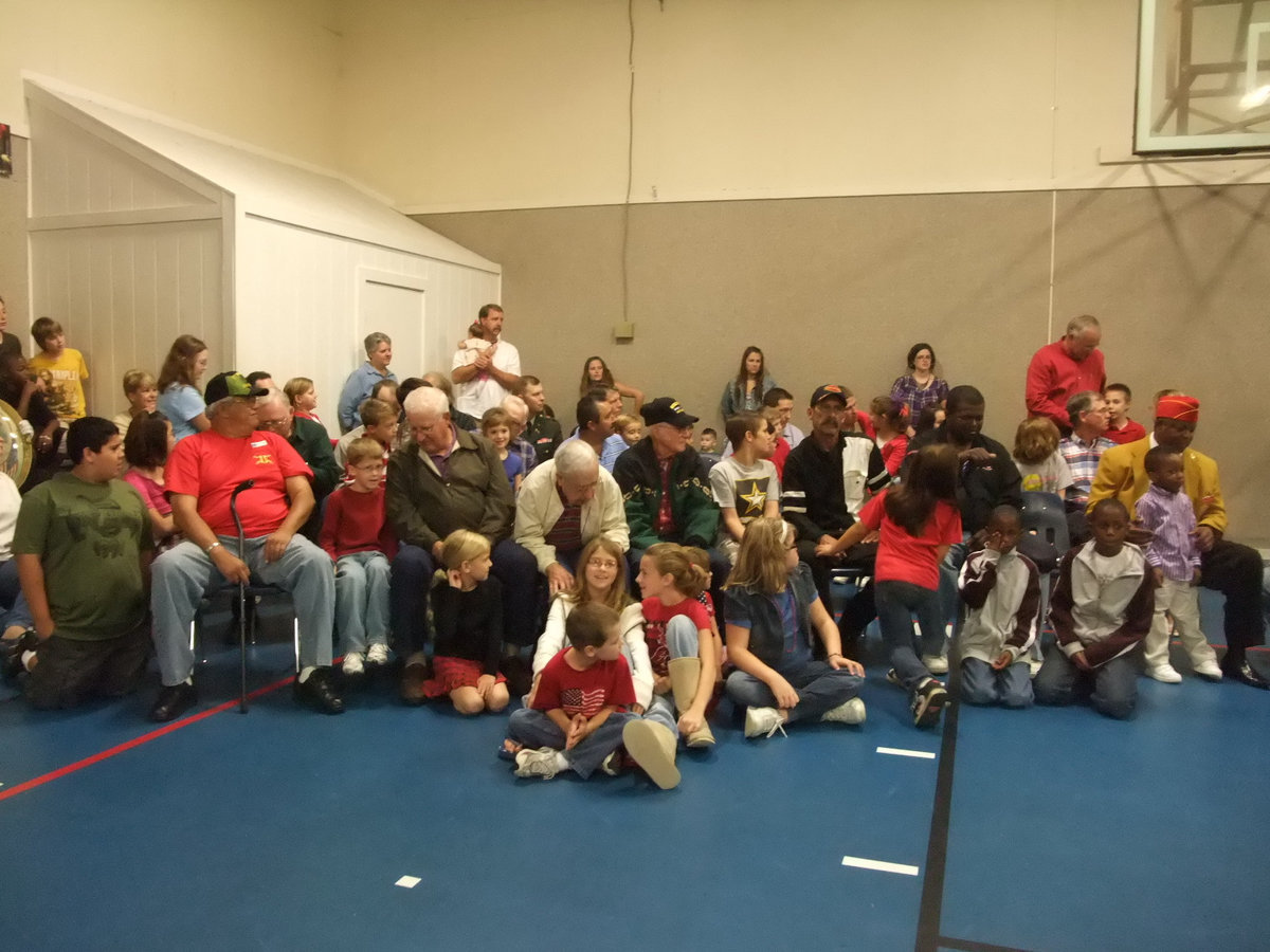 Image: Veterans and Family Members — Many Veterans came to the celebration to stand by family members.