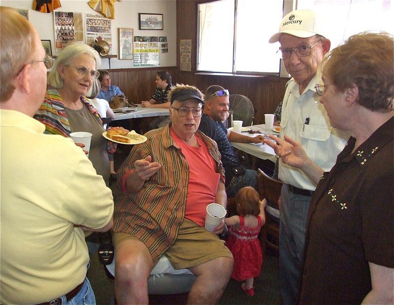 Image: Catching up — Ervin shares a tale with Gary Love, his wife Ann Byers, his childhood friend Marvin Socol and Marvin’s wife Maxine.