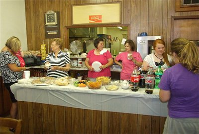 Image: What a staff — Doris Mitchell, Nancy Byers, Sandy Eubank and Katie Byers serve the guests.