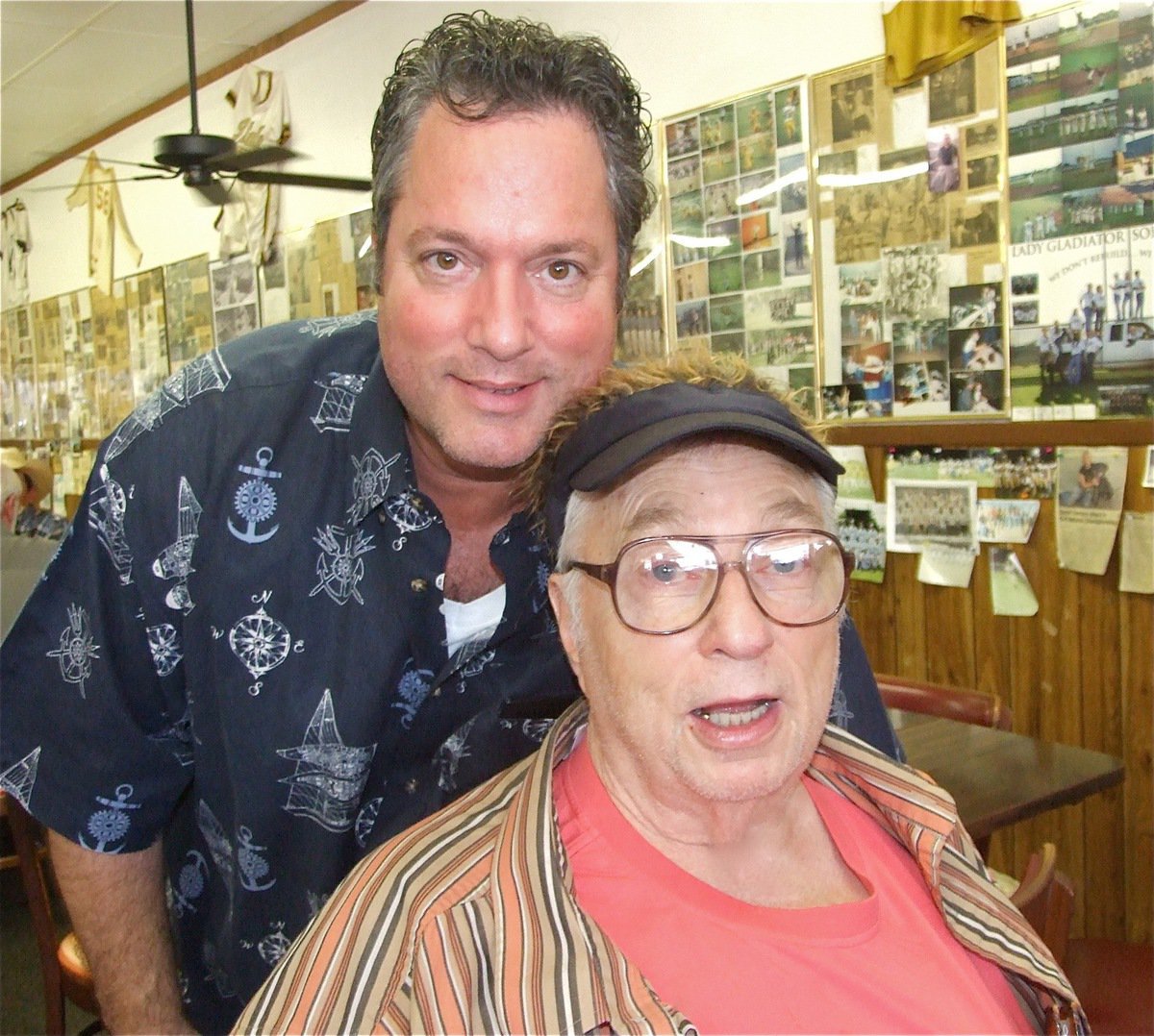 Image: That’s my boy! — Ervin poses with, his third born son, Kenny Byers who drove in from Houston to celebrate his dad’s 80th birthday.