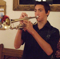 Image: “Taps” — Italy Junior High student, Jason Witte, played the stirring song after the flag ceremony.
