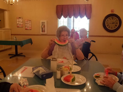 Image: Evelyn Jenkins — Evelyn Jenkins couldn’t get enough watermelon! She is such a sport, posing for this picture.