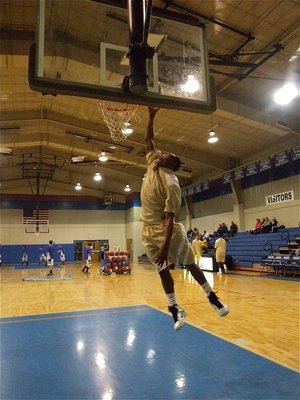 Image: De’Andre can leap — Gladiator De’Andre Sephus grabs air during the pre-game warm-ups.