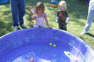 Image: Pick a Duck — All the kids have fun playing in the water and sand.