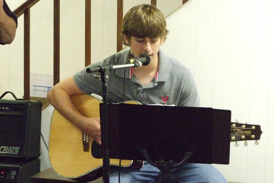 Image: Jerod Casey entertains — Music entertainment was provided by Jerod Casey during the barbecue dinner.