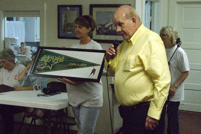 Image: Auction items — Signed Dallas Stars pennant was auctioned.