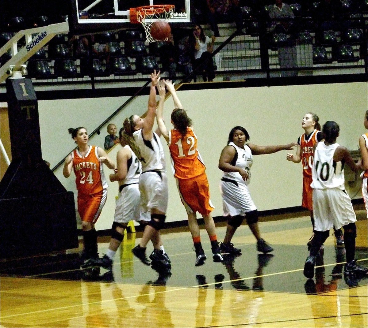 Image: Shelbi Gilley and the Italy JV Gladiators try to hand Kemp a loss — Italy JV Lady Gladiator Shelbi Gilley disrupts a shot attempt by the Kemp JV Lady Jackets. Despite Italy’s aggressive defense, Kemp left with the win, 31-24.