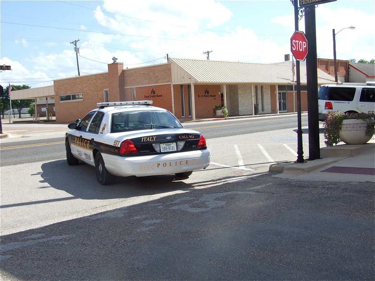 Image: Assistance needed — An Italy Police unit races to Milford to assist Milford Police in crowd control.