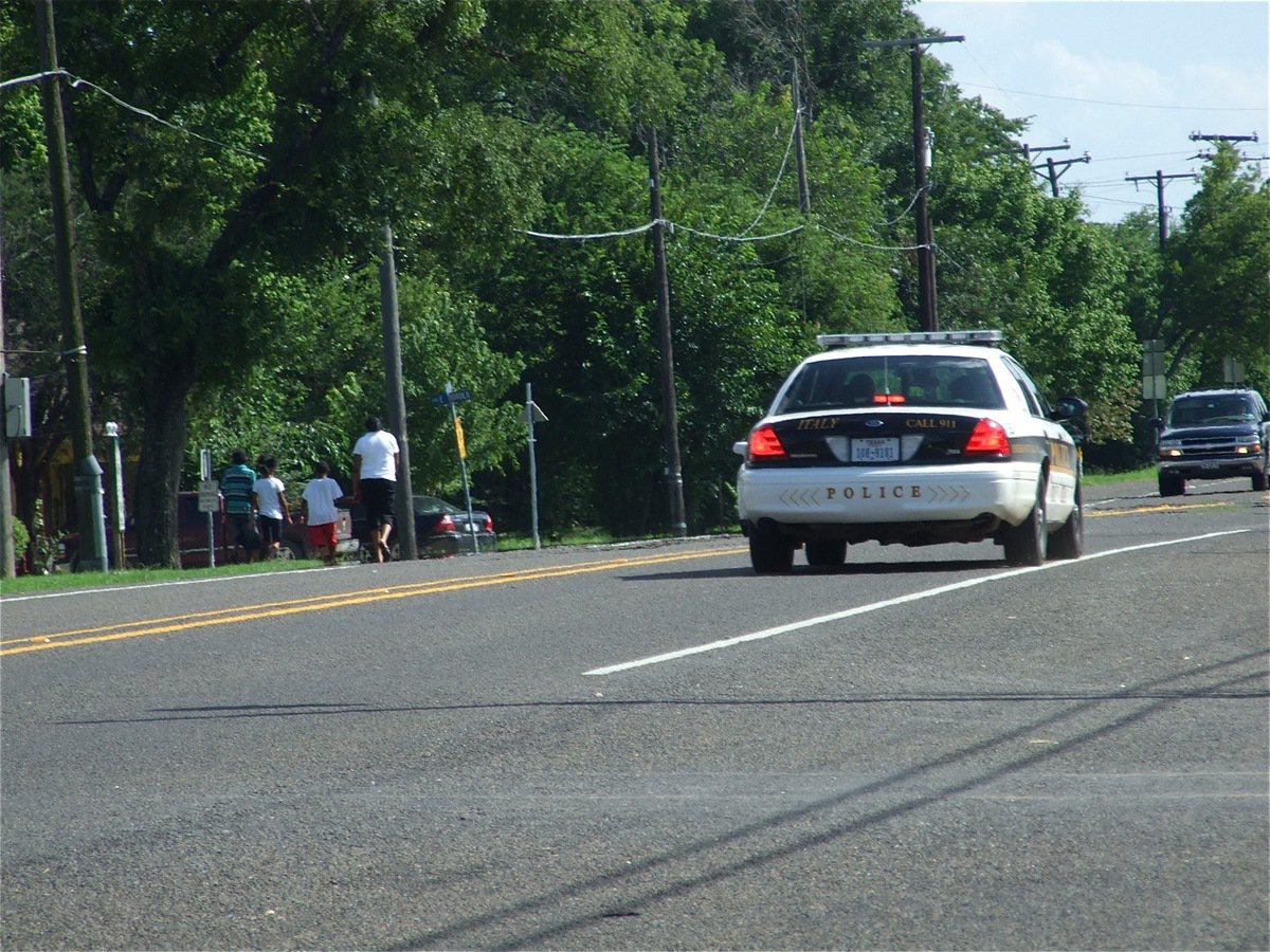 Image: On the scene — An Italy Police unit arrives in Milford to survey the situation.