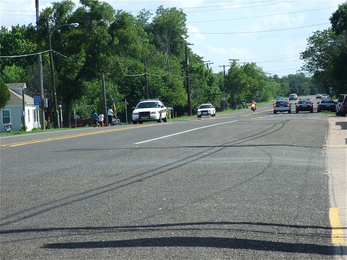 Image: Strength in numbers — Italy Police Units and DPS Troopers monitor traffic in and out of Milford pulling several vehicles over.