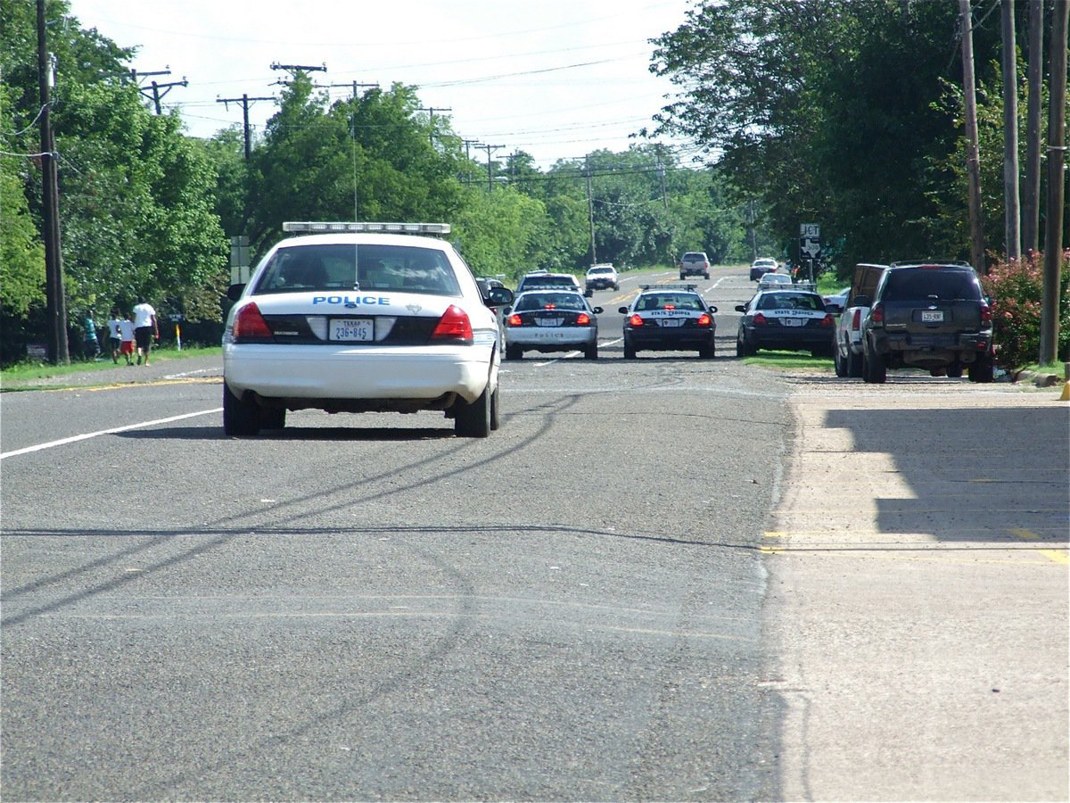 Image: Securing the area — Another Italy Police unit arrives in downtown Milford to assist with crowd control.