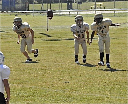 Image: Kendrick kicks — Kendrick Norwood(1) kicks off to the Bulldogs.