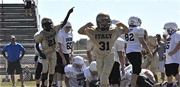 Image: Gladiators’ ball! — Italy recovers an onside kick during the IYAA Majors game against Dawson on Saturday.