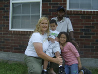 Image: The Lusk family — Amanda, Donovan, Darrin and April Lusk, a family picture.