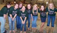 Image: FCCLA members wearing their “Peace, Love, FCCLA” T-shirts — Wearing their “Peace, Love, FCCLA” T-shirts, printed by Italy High School student Lauren Geralds, during the Ellis County Youth Expo are: Misty Salcido, Lauren Geralds, Britany Perry, Krystal Johnson, Lisa Olschewsky, Lexie Miller, Kelli Strickland and Megan Hopkins.