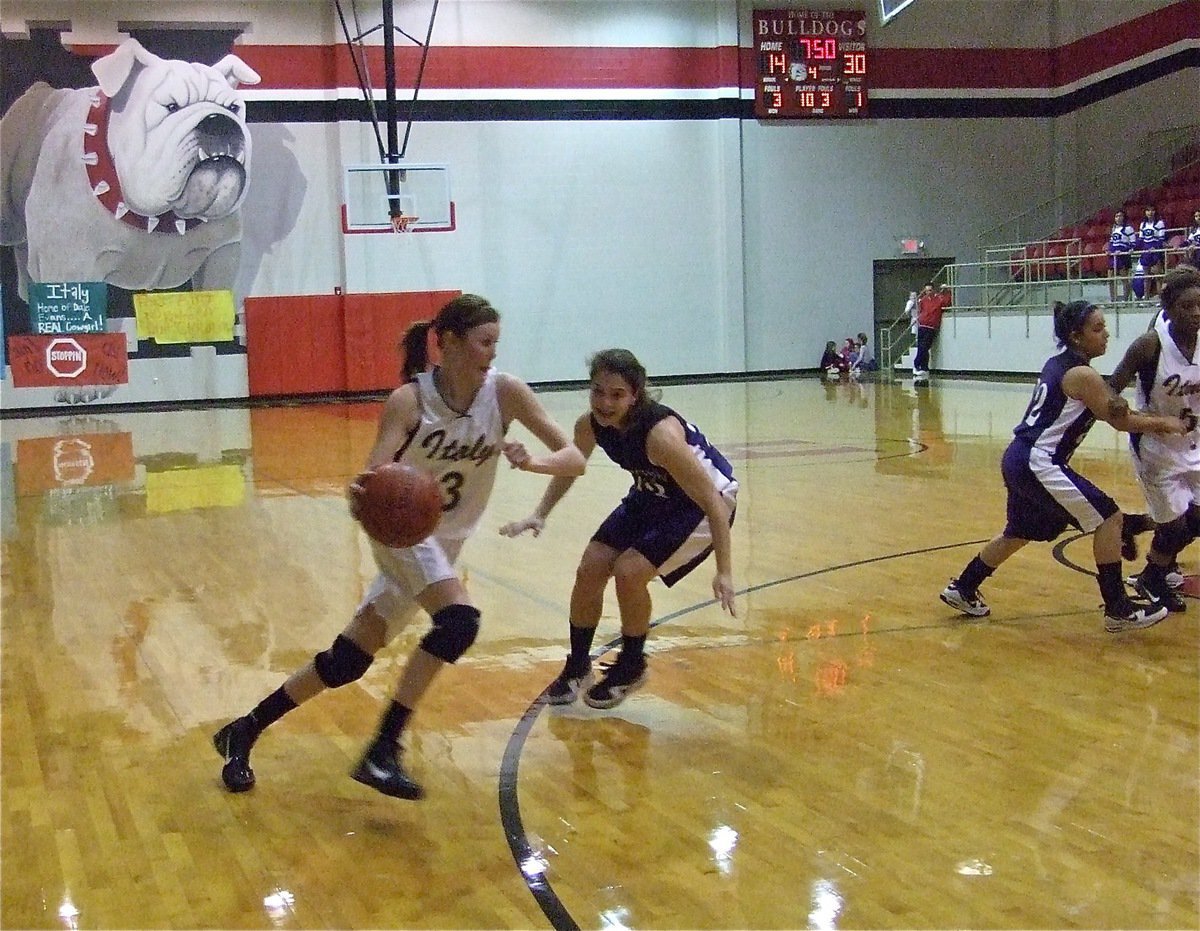 Image: Making it happen — Kaitlyn Rossa(3) drives to the bucket early in the 4th in an effort to generate offense for the Lady Gladiators.