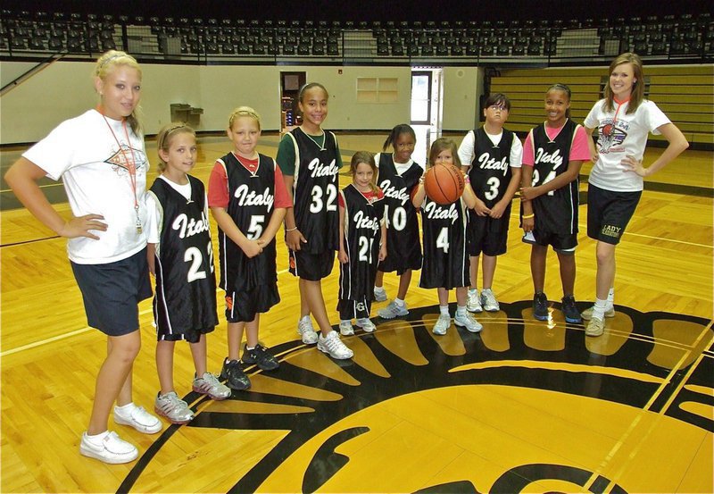 Image: “Hoop it up’ with Rich &amp; Ro” campers are in full uniform — (L-R): Coach Megan Richards, Paige Henderson(22), Brycelen Richards(5), Michaela Tarrant(32), Evie Hernandez(21), Destiny Harris(40), Hailey Routson(4), Jenna Holden(3), Emily Cunningham(24) and Coach Kaitlyn Rossa. Not pictured: Peyton Henderson.
