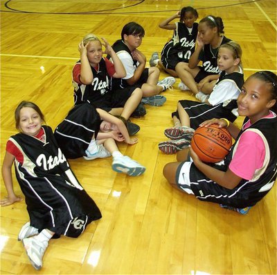 Image: Taking a timeout — Campers take a well deserved break after scrimmaging.