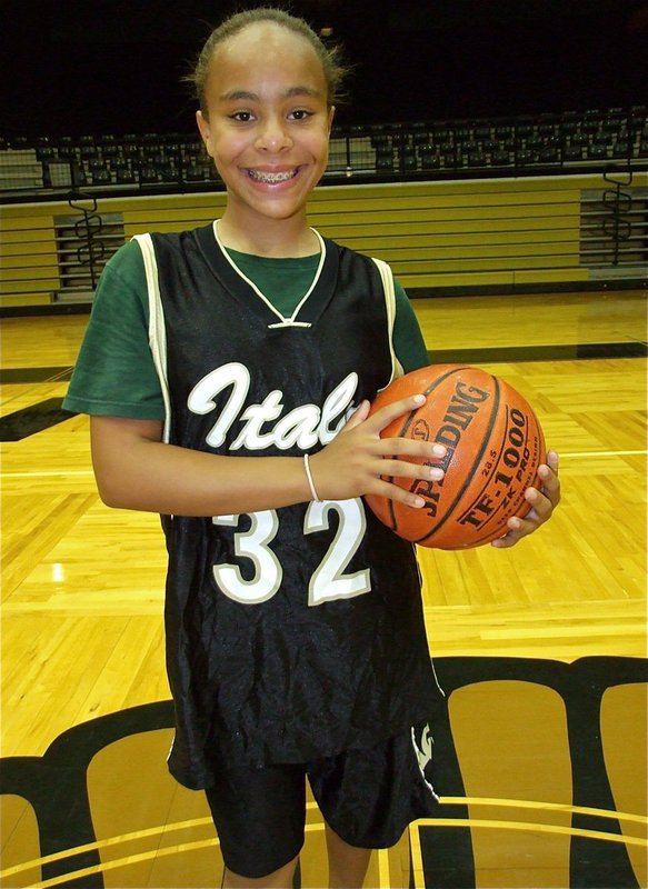 Image: The right touch — Michaela Tarrant takes advantage of the camp to hone her basketball skills.