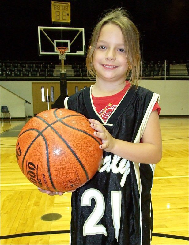 Image: Evie is ready — Under that oversized Lady Gladiator jersey is the next golden star, Evie Hernandez.