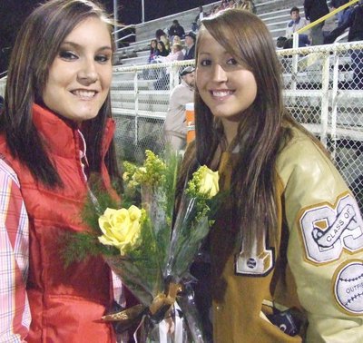 Image: Annalee and Angelica — Annalee Lyons and Angelica Garza gave each senior a yellow rose.