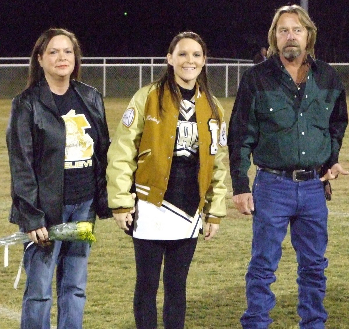 Image: Lindsey Brogden — Lindsey and her parents say goodbye to Willis Field.