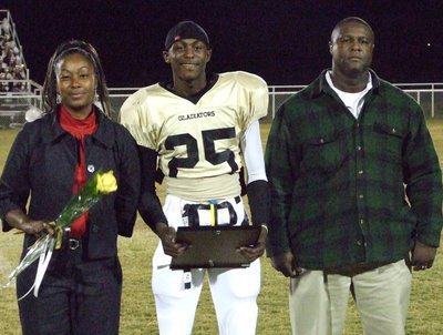 Image: Diamond Rodgers — Diamond is escorted by his family.