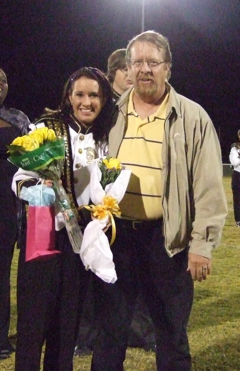 Image: Tess Clark — Tess was escorted by her father.