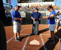Image: Umpire Joe Windham, of Italy, confers with the coaches — As an UIL official, umpire Joe Windham oversees the pregame conference with coach Bobby Cervenka of the Waco Robinson Rockettes and coach Kathy Barker of the Paris North Lamar Pantherettes in 3A semifinals action on Friday, June 4 at McCombs Field on the University of Texas campus. – Photo by: Rod Aydelotte, Waco Tribune Herald