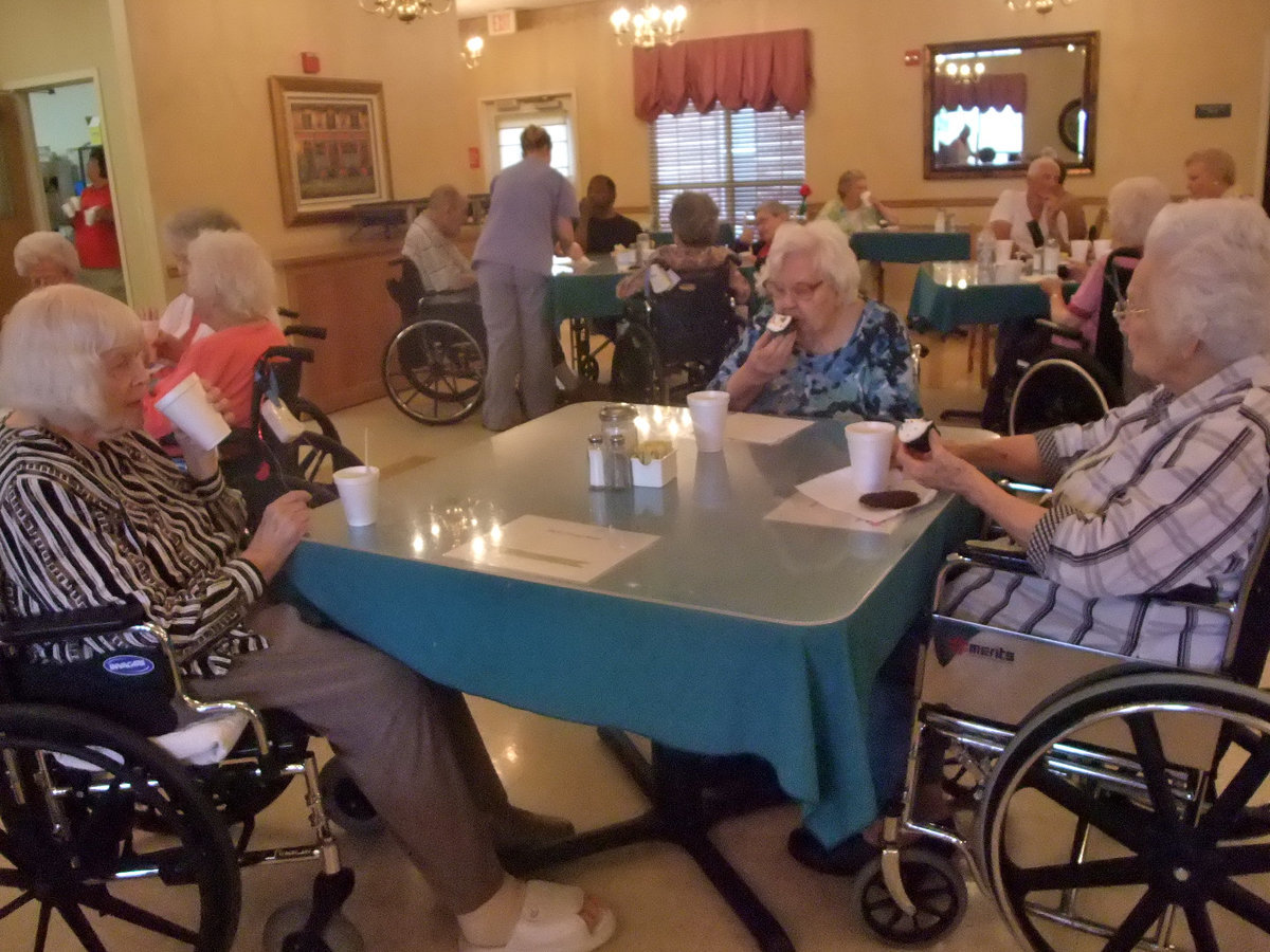 Image: Let Them Eat Cake — Everyone here is enjoying the birthday cupcakes.